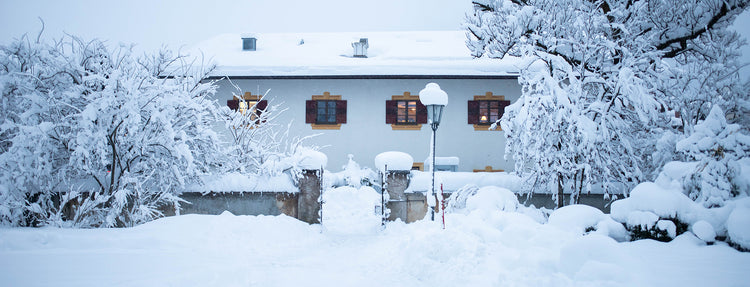 wintertime-ismall german village covered with snow